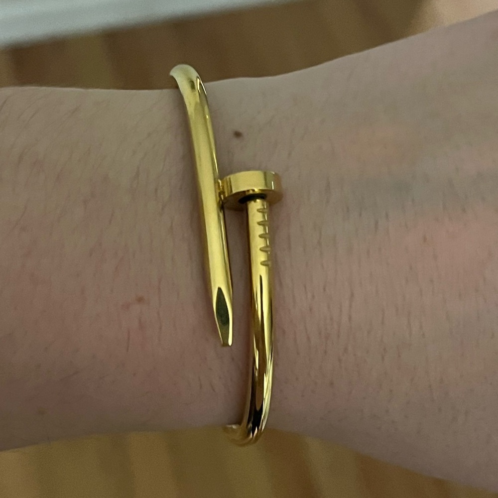 Gold tone nail bracelet